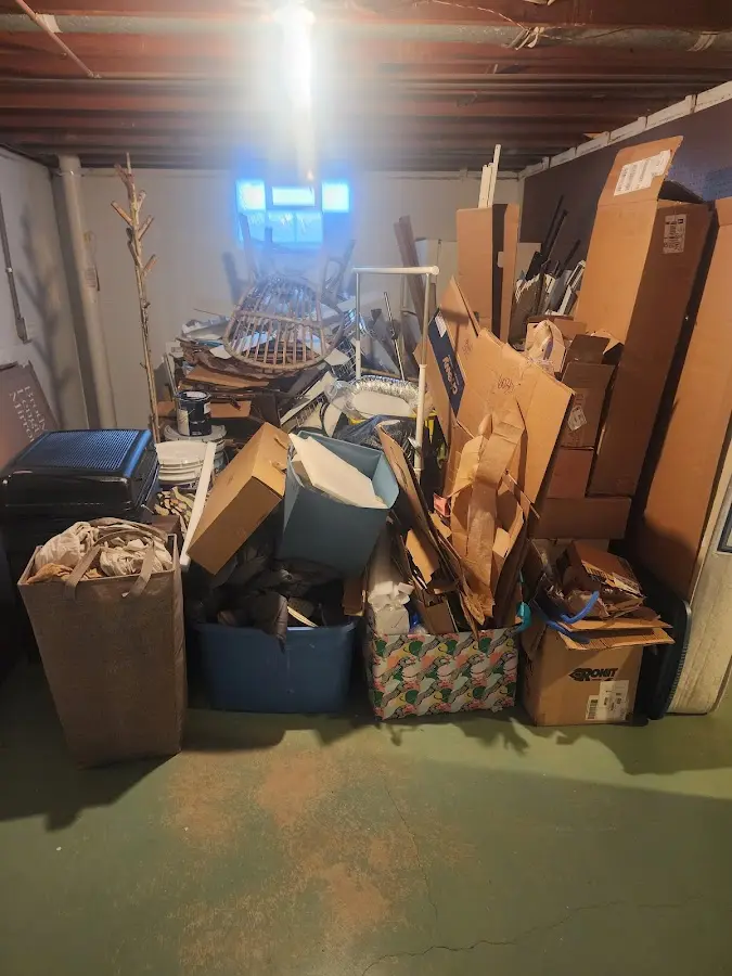 Roll-off dumpster container at job site for 6 Yard Dumpster Rental in Corning